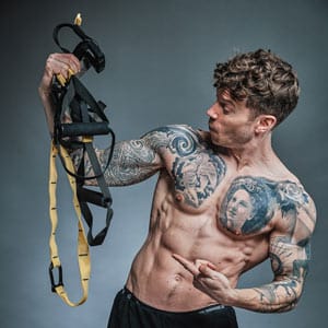 How I Can Help You - Coach Adam Fitness Freedom Athletes with a TRX suspension trainer