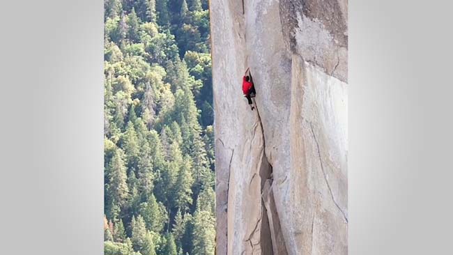climbing a mountain face